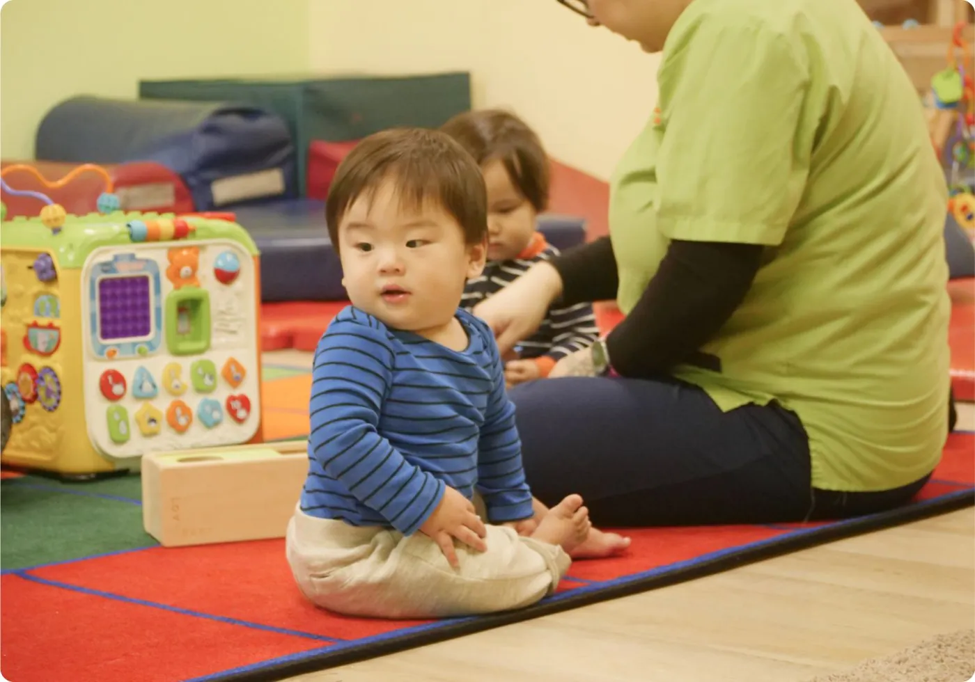 Teacher and child at Arcadia Preschool Montessori Academy